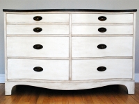 Bow-front antiqued dresser