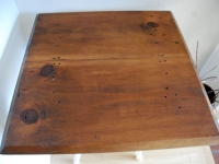 Curvy-legged table with reclaimed wood