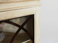 White antiqued corner cabinet