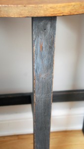Detail on the leg of the halfmoon table